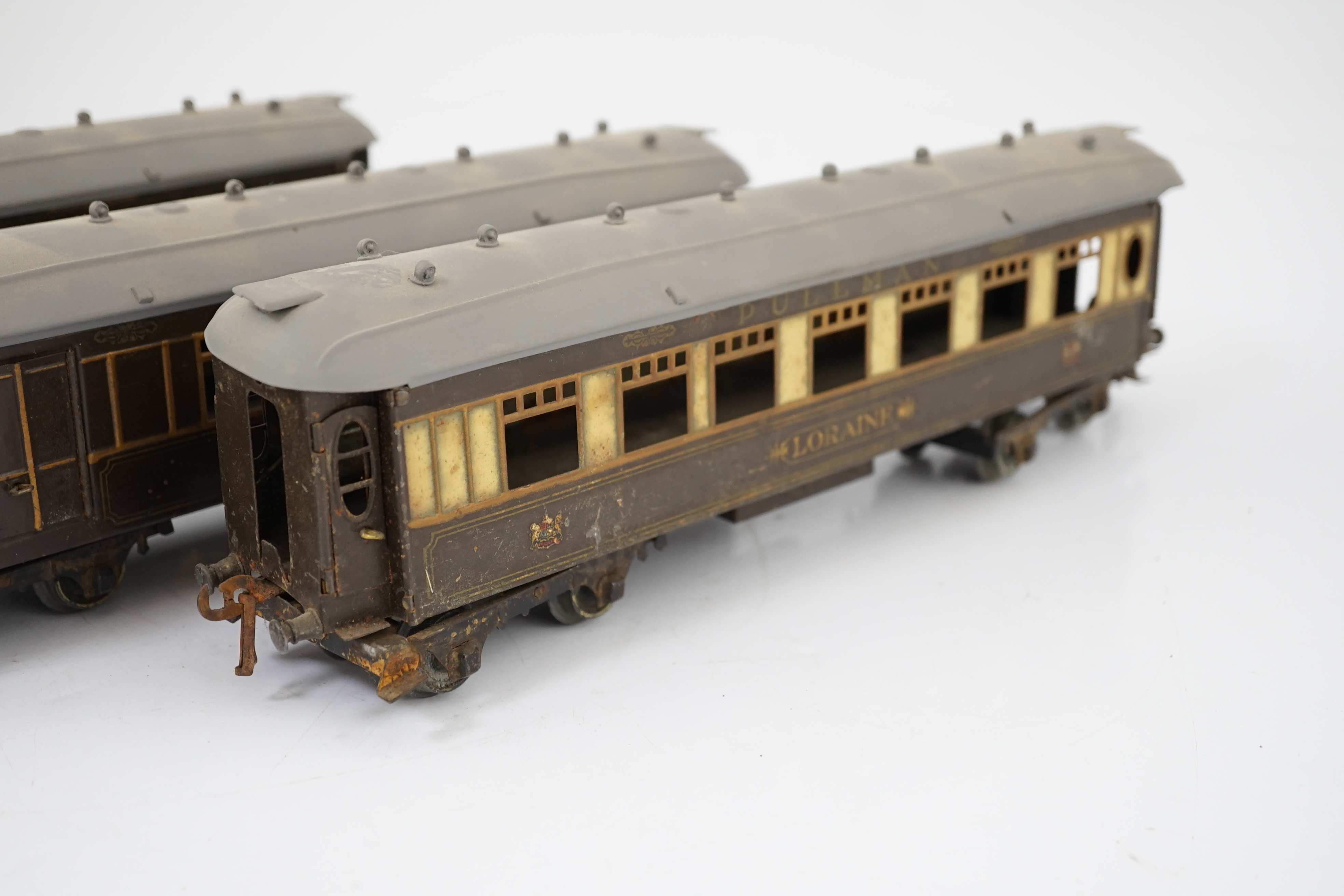 Three Hornby Series 0 gauge tinplate Pullman cars; Loraine, Arcadia and Montana
